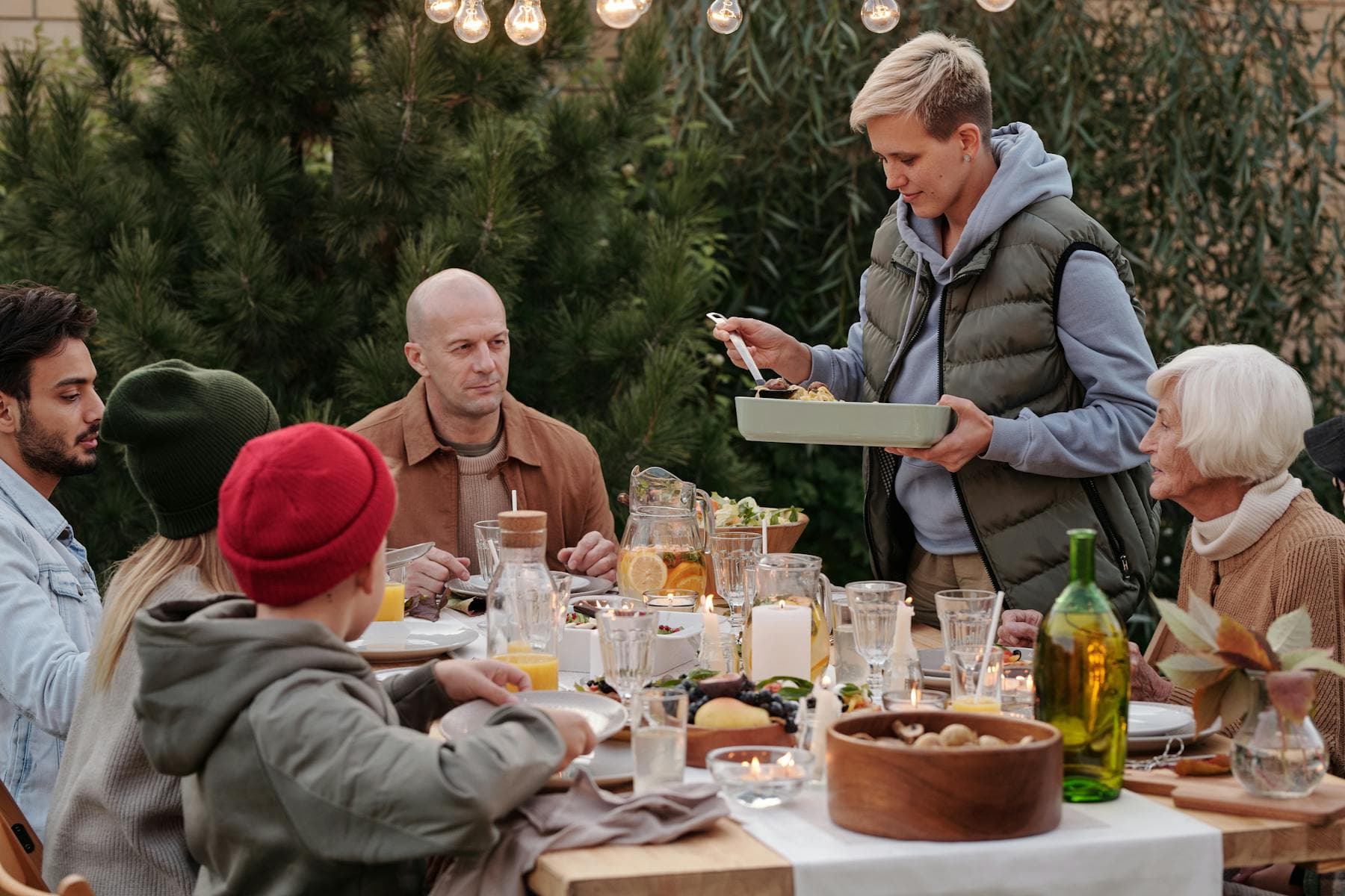 Multigenerational family reunion dinner with relatives planning together